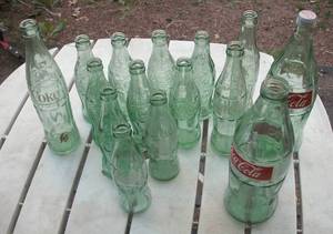lot 94 image: Coca Cola bottles - empty...