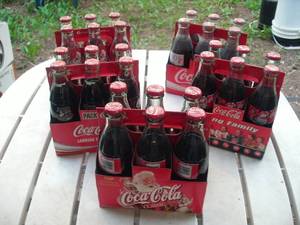 lot 96 image: Coca Cola 6-packs - full bottles...