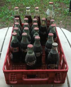 lot 97 image: Coca Cola bottles - full includes t...