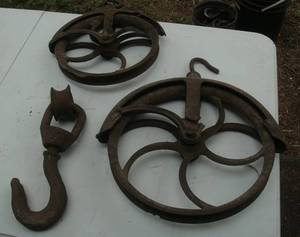 lot 4 image: Vintage pulleys with well - no mark...