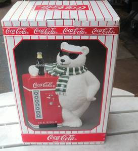 lot 106 image: Coca Cola cookie jar...