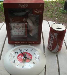 lot 107 image: Coca Cola clock, alarm clockbank, ...