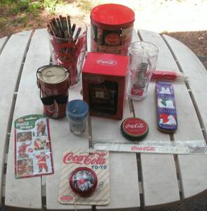 lot 117 image: Coca Cola watch, mini clock, tin, y...