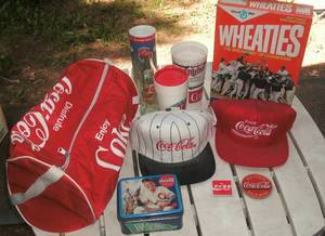 lot 119 image: Coca Cola hats, Wheaties box - empt...