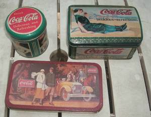 lot 125 image: Coca Cola tins, 2 empty...