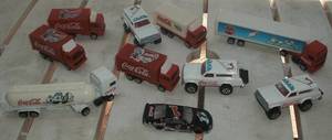 lot 128 image: Coca Cola cars & semis...