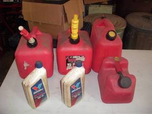 lot 133 image: Gas cans - empty, 10W40 oil - full...