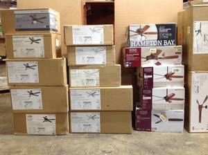 pallet of assorted  Hampton Bay and Home Decorator  ceiling fans various models sizes and conditions customer returns see pictures