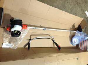 Echo 25.4 cc Gas 2-Stroke Cycle Trimmer in working condition see all pictures
