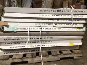 lot 2 image: 19 boxes of Cap A Tread Laminate to Cover Stairs 1 in. Thick (mixed of colors) see all pictures