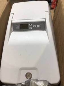 lot 24 image: GE 40,200 Grain Water Softener in good condition see all pictures