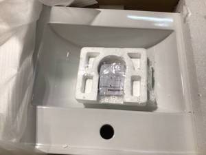 lot 41 image: Timeless Home 24 in. W x 18.31 in. D x 19.69 in. H Single Bathroom Vanity in White with Porcelain good condition see all pictures