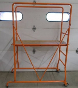 SCAFFOLDING, WHEELS ON ONE SIDE.