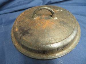 NO8 SELF BASTING CAST IRON LID.