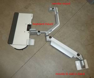 lot 59 image: New Humanscale brand post mount monitor and keyboard and mouse assembly