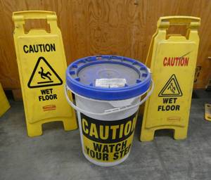 lot 110 image: Two Wet floor signs and a spill kit