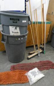 lot 113 image: Cleaning supplies lot - 2 trash cans, many mop handles, brooms, mop heads
