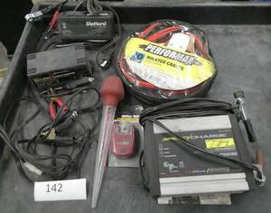 lot 142 image: Battery Charger lot and Jumper cables