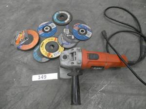 lot 149 image: Black & Decker grinder with a bunch of grinding wheels