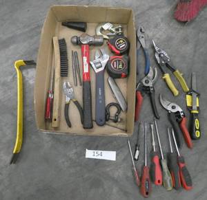 lot 154 image: Group of tools - snips, screwdrivers, pry bar, ball peen hammer, tape measures, punches, wire brush and more
