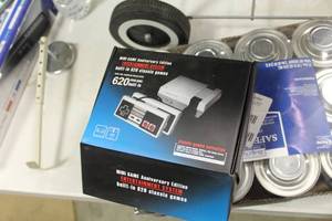 lot 647 image: Mini Entertainment System Anniversary Edition (in box)  with 620 Classic Games Built-In