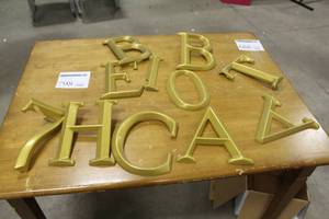 lot 798 image: Lot of (11) Plastic Letters  - B, B, T, A, E, I, O, 7, H, C, A
