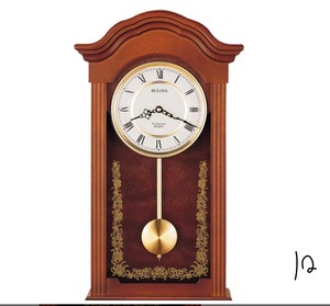 lot 12 image: BULOVA 22.5 in. H x 12.25 in. W Pendulum Chime Wall Clock