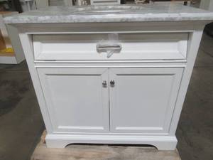 Windlowe 37 in. W x 22 in. D x 35 in. H Bath Vanity in White with Carrera Marble Vanity Top in White with White Sink - Missing Block stop on top drawer, cracked top.