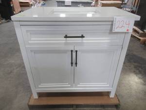 Laney 36 in. W Bath Vanity in White with Engineered Stone Vanity Top in White and White Basin - Scratch and Dent, Top is Scratchedchipped.