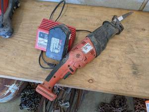 lot 48 image: Milwaukee Sawzall w Battery and Charger