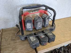 lot 49 image: Milwaukee Charging Station w (6) Batteries