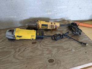 lot 127 image: DeWalt DW402 Angle Grinder (Bad Cord) and Tool Shop Angle Grinder (Works)