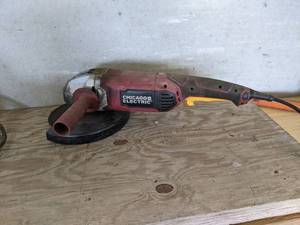 lot 132 image: Chicago Electric 9 Heavy Duty Electric Angle Grinder - Tested and works.