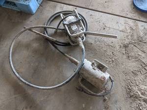 lot 146 image: Pair of Concrete Vibrators - Both Motors Run but They Dont Vibrate