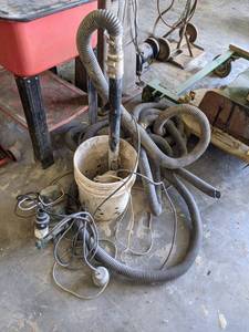 lot 239 image: Zoeller Co. Cast Iron Sump Pump - Unit Powers On  Hose and Non-Working pump