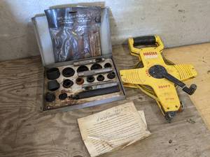lot 248 image: 15 pcs Set Self-Centering Punch Set and 200 Tape Measure