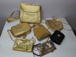 lot 179 image: Lot of (7) Golden Purses Gold and Black