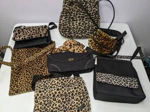 lot 150 image: Lot of (7) Cheetah Print Purses