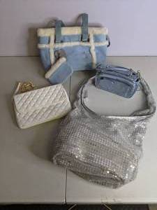 lot 76 image: Lot of (4) Purses Glittery Silver and Blue 