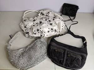 lot 52 image: Lot of (4) Purses Black, Silver, Stars