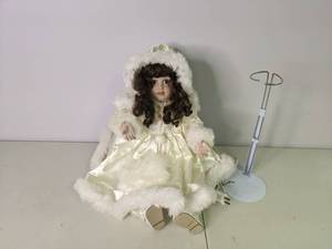 lot 128 image: Vintage Santas Best Porcelain Doll with Stand