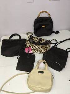 lot 277 image: Lot of (6) Purses Cream and Black
