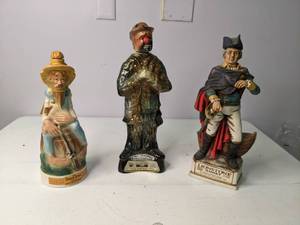 lot 25 image: Vintage Set of (3) Cabin Still, Lionstone, and Jim Beam Decanters
