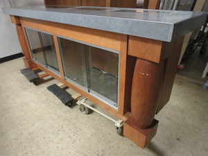 lot 502 image: DISPLAY COUNTER, W SOLID WOOD BASE, DECORATIVE SHEET METAL-WRAPPED TOP