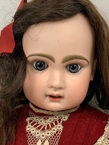 lot 1 image: Antique Brunette Bisque-Head Doll wGlass Eyes and Composite Body, 26 Tall