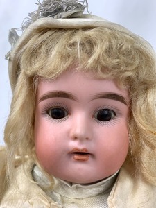 lot 4 image: Antique Blonde Bisque-Head Composite Doll, 17 Tall