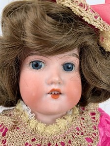 lot 7 image: Lovely Antique Bisque-Head Doll w Kid Leather Body in Pink Velvet Gown, 16 Tall