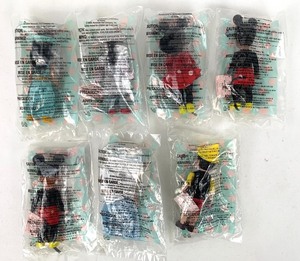 lot 30 image: Madame Alexander 2004 McDonalds Disney Dolls, Set of 7, Unopened Pouches