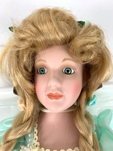 lot 72 image: Designer Guild One Upon a Rhyme Collection Porcelain Doll - Rapunzel