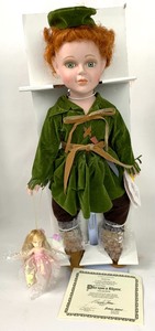 lot 73 image: Designer Guild Once Upon a Rhyme Collection Porcelain Doll - Peter Pan